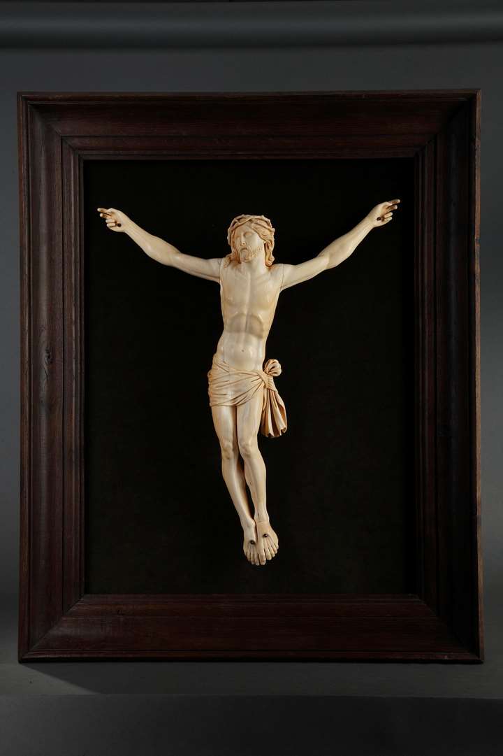 A carved ivory figure of the Crucified Christ